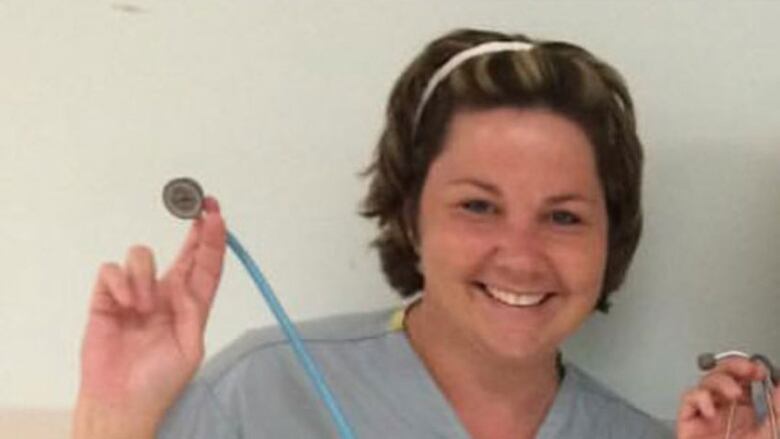 Former nurse Nicole Ruest holding a stethoscope