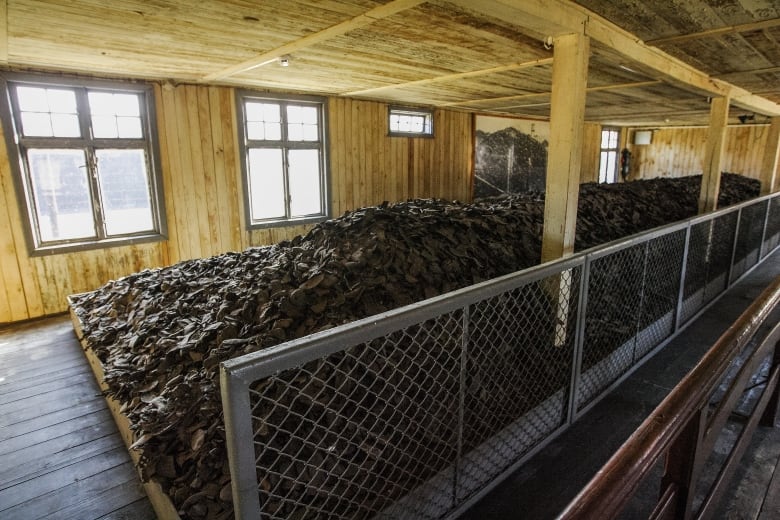 Heap of prisoners shoes is seen in former Nazi German Concentration Camp Stutthof