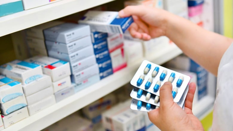 Drugs on a pharmacy shelf.