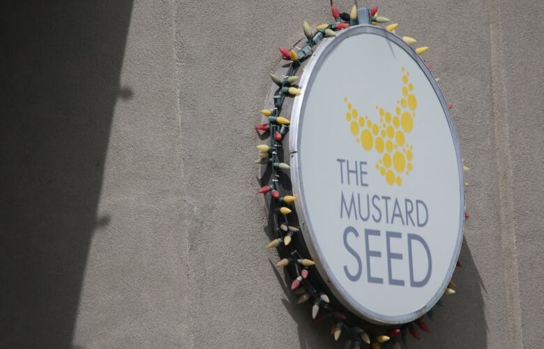 a logo that read The Mustard Seed is pictured.