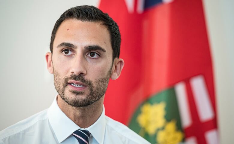 Ontario Minister of Education Stephen Lecce speaks to teachers before giving remarks, in Toronto, on Aug. 22, 2019.