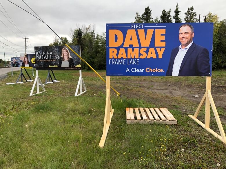 Signs for election candidates dot Yellowknife's Franklin Avenue.