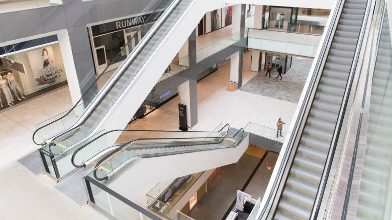 Few people walking through a shopping mall in Montreal