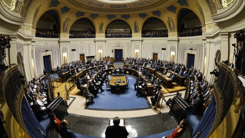 The Manitoba legislative chamber is seen packed with MLAs, special guests and visitors in the gallery during the speech from the throne on Nov. 19, 2019