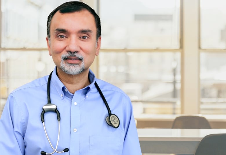 Photo of Dr. Sohail Gandhi with a stethoscope around his neck. 