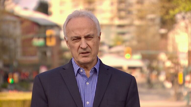  A man speaks to CBC News on a city street.