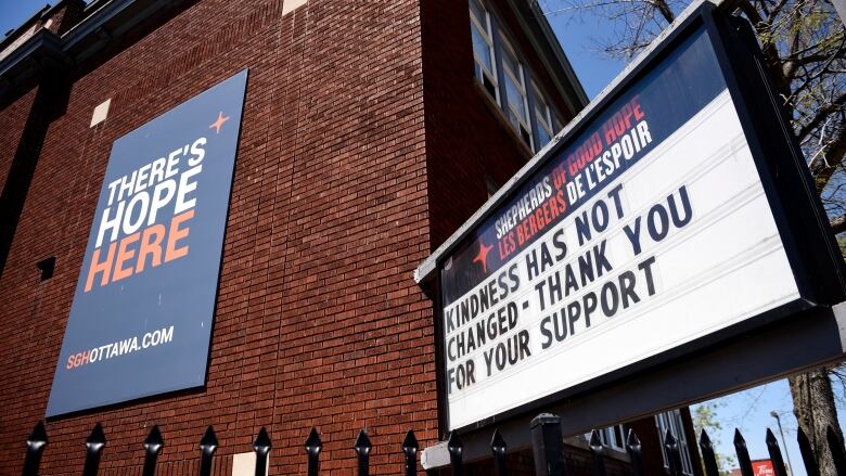 A sign outside a shelter thanks people for support.