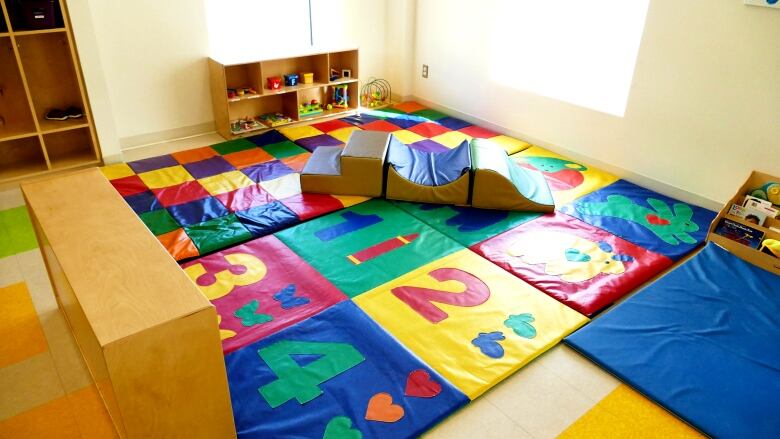 A mat with colourful numbers in a daycare