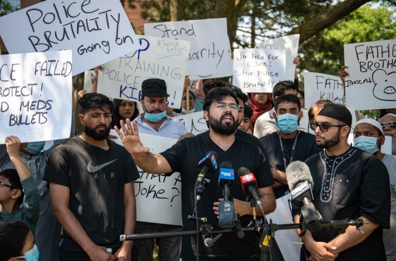 Hashim Choudhary addresses the media in front of the apartment building where his uncle, Ejaz Choudry, a 62-year-old man who family members said was experiencing a schizophrenic episode, was shot by Peel Police and died at the scene the previous night, in Mississauga, Ont., Sunday, June 21, 2020. 