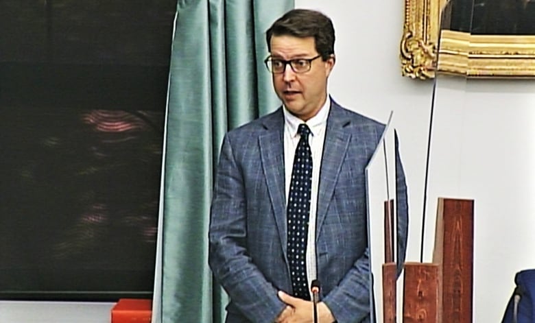 PC MLA Brad Trivers speaking in the P.E.I. legislature in 2021, when he was the province's housing minister.