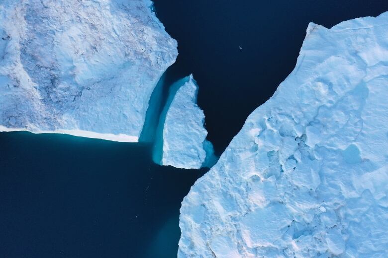 In this aerial view icebergs float in the Ilulissat Icefjord on August 04, 2019 near Ilulissat, Greenland.