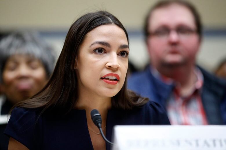 Rep. Alexandria Ocasio-Cortez, D-N.Y., testifies on the Trump administration's proposed poverty line calculation changes before a subcommittee of the House Committee on Oversight and Reform on Capitol Hill.