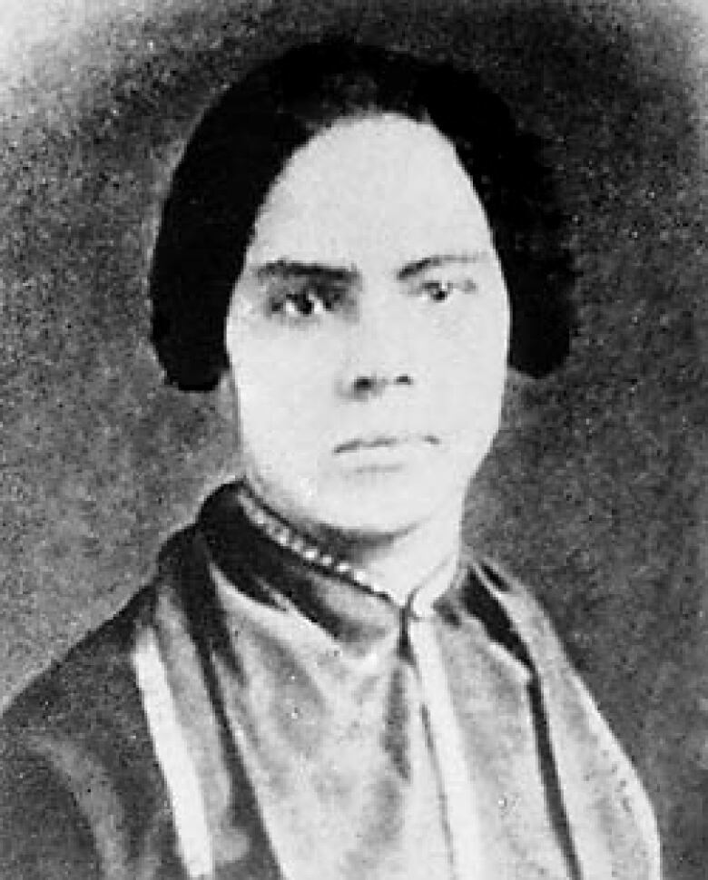 A black-and-white photo of a woman