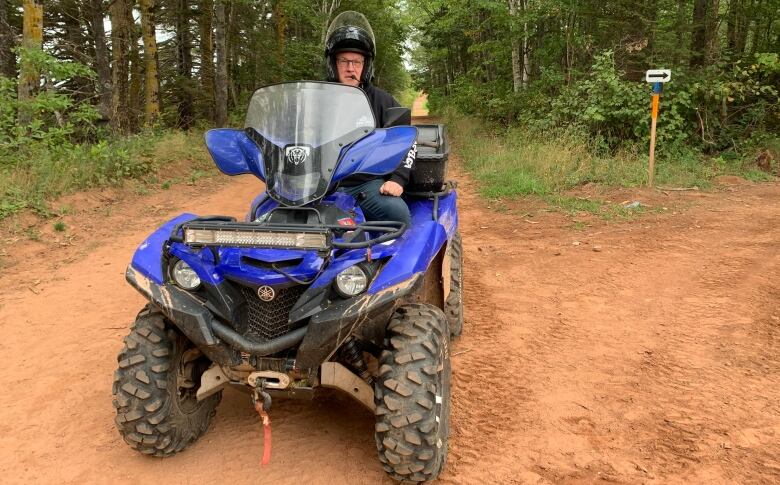 Peter Mellish on an ATV.