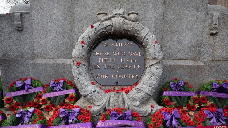 Wreaths line the base off the cenotaph during the Victory Square Park Remembrance Day ceremony in Vancouver on Nov. 11, 2019. 