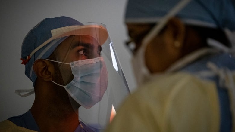 Surgical oncologists Dr. Usmaan Hameed operates on a patient in North York General Hospital on May 26, 2020.