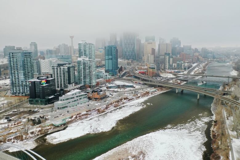 Shots from drone of the Bow River in downtown Calgary in December 2020