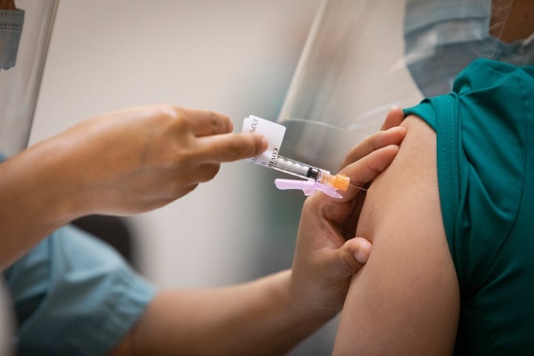 Person receives vaccine 