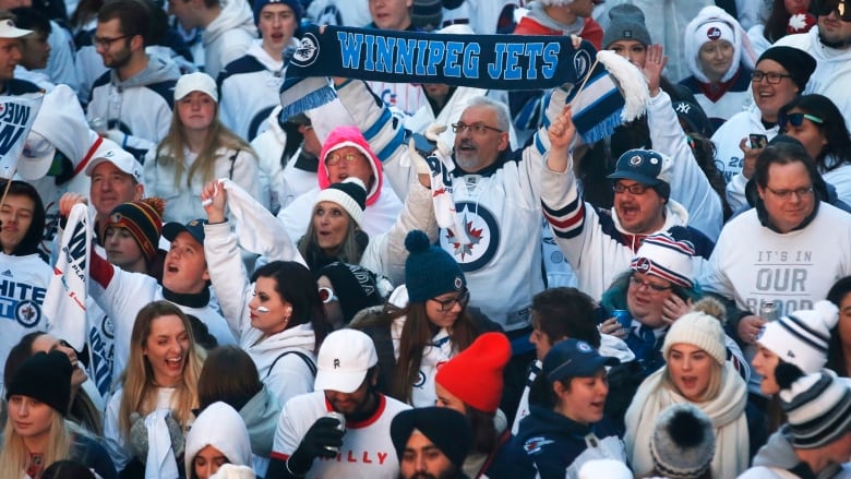 Winnipeg Jets' fans get warmed up at the Whiteout Street Party prior to the second NHL playoff game against the St. Louis Blues during in Winnipeg on Friday, April 12, 2019. 