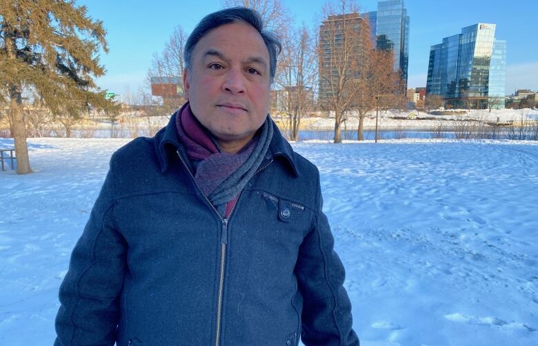 University of Saskatchewan epidemiologist Nazeem Muhajarine standing outside during the winter.