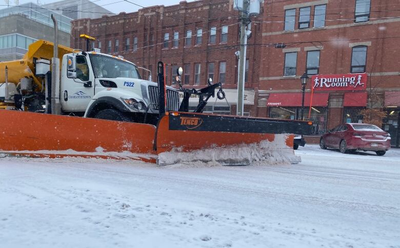 Plows were bust trying to keep the roads clear Tuesday.