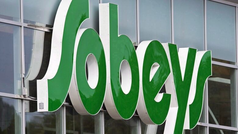 A closeup shot of a Sobeys sign.