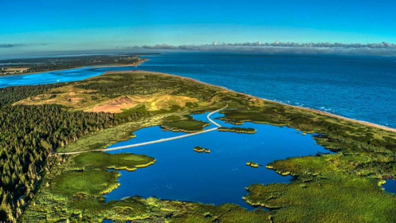 A Parks Canada image of its park property at Greenwich on the North Shore of P.E.I. The line showing in the middle of the inland body of water is the park's well-known boardwalk. 