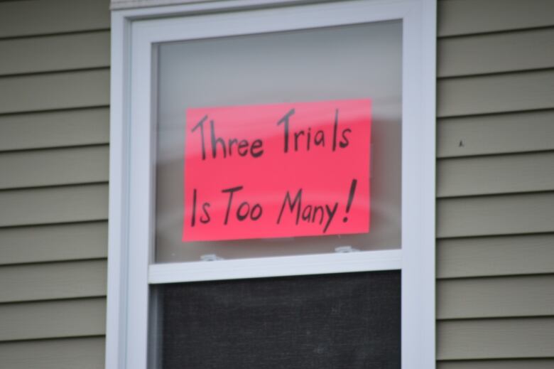 sign in window saying three trials is too many