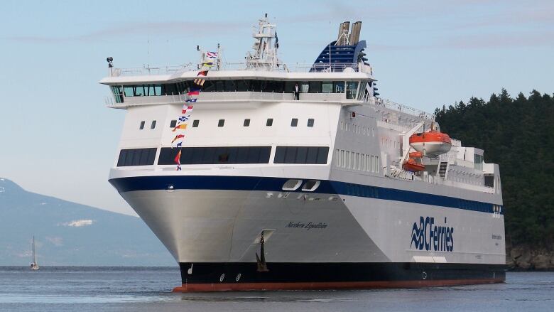 A large vessel called the 'Northern Expedition' sails on the open sea.