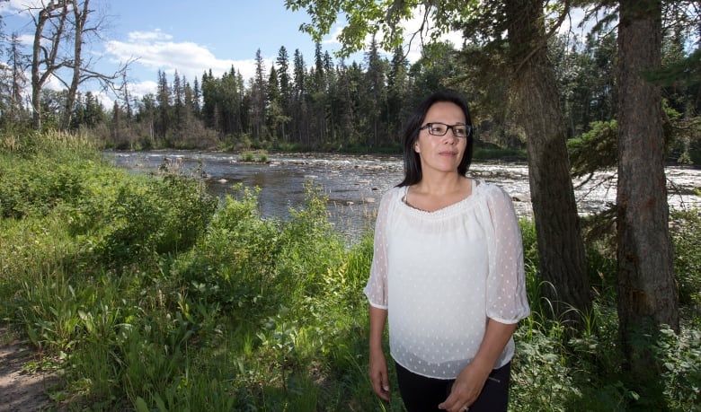 Chief Tammy Cook-Searson of the Lac La Ronge poses for a photo near a Montreal river between La Ronge and Air Ronge on Friday, July 24, 2015.