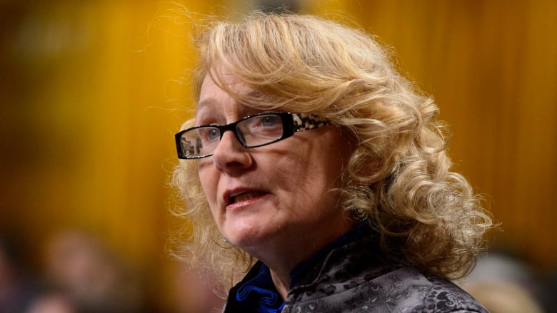 A woman speaks during question period in the House of Commons.