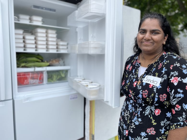 Co-founder Sandra Sunil at the community fridge, which began August 8 and is open 24/7 in Charlottetown. 