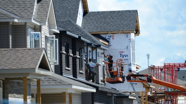 a row of homes under construction