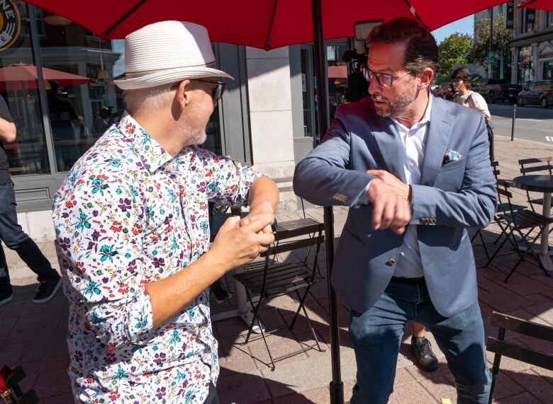 Bloc Quebecois leader Yves-Francois Blanchet  greets a supporter.