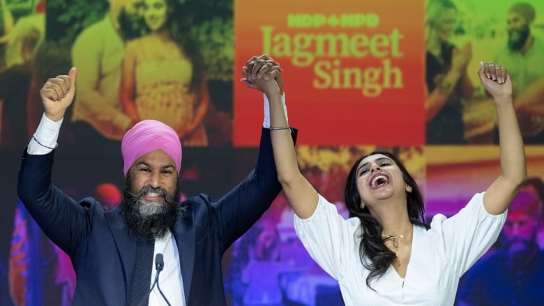 NDP Leader Jagmeet Singh and his wife Gurkiran Kaur Sidhu arrive on stage to deliver his concession speech at his election night headquarters during the Canadian federal election in Vancouver, Monday, September 20, 2021.