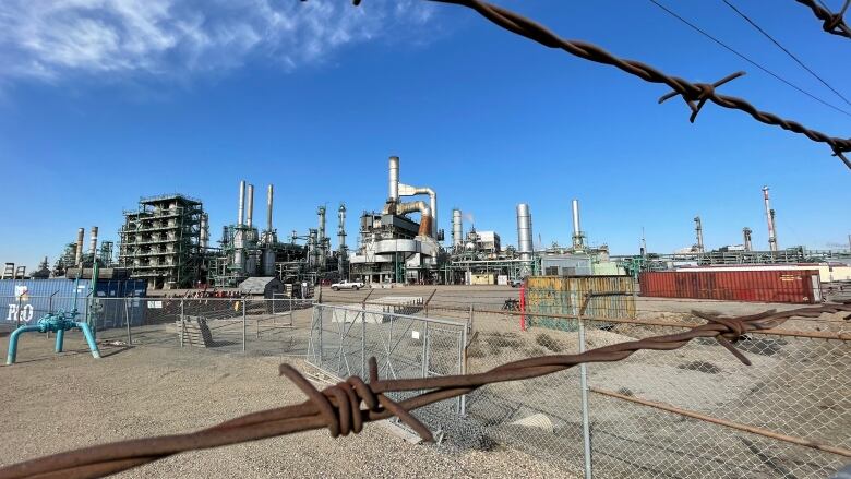 Fence at a refinery complex. 