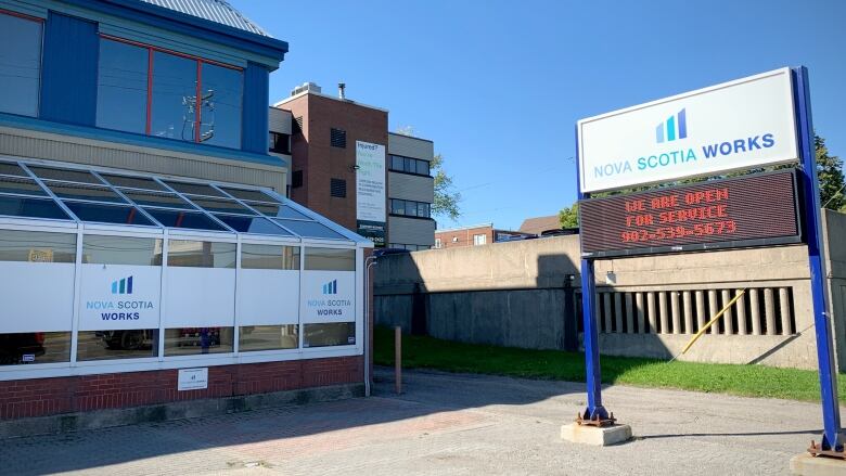 A sign outside a building says Nova Scotia Works.