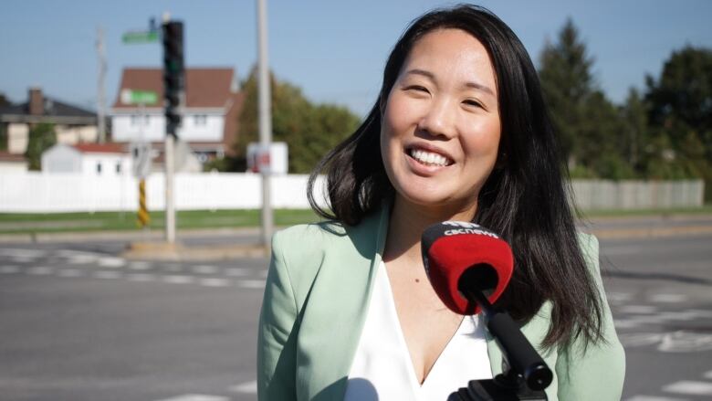 woman light green blazer