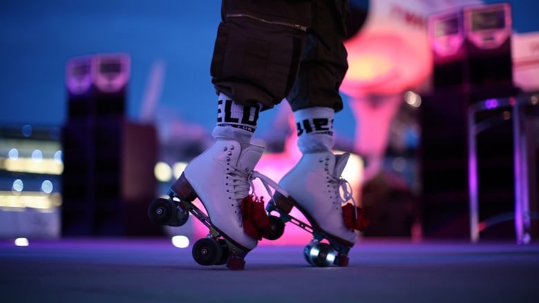 A person roller skates. 