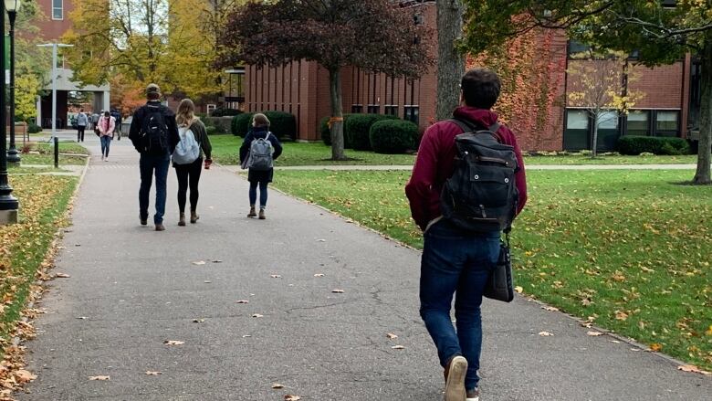 Students walking on the UPEI campus.