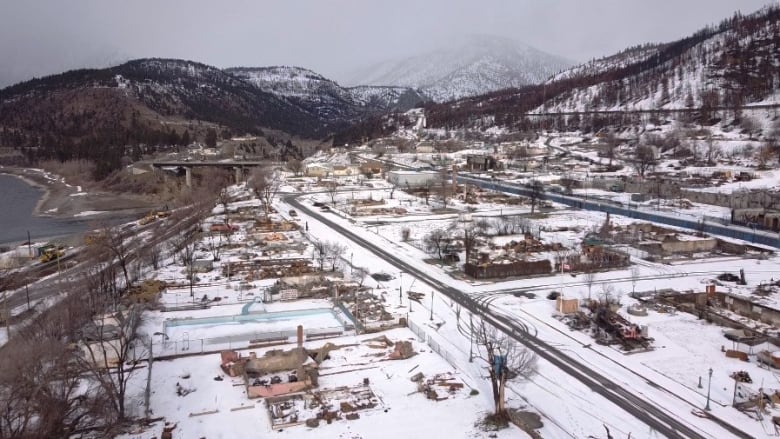 Snow covered community that has been burnt