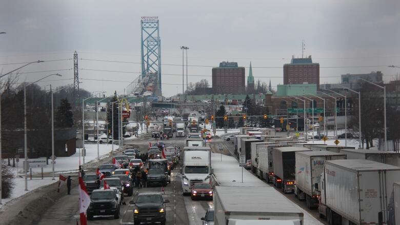 trucks and cars backed up near the Ambassador Bridge