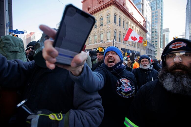 convoy protesters yell