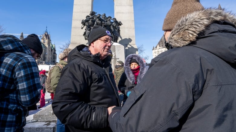 Independent MPP Randy Hillier greets anti-mandate protesters at the War Memorial in Ottawa on Sunday, February 13, 2022. 