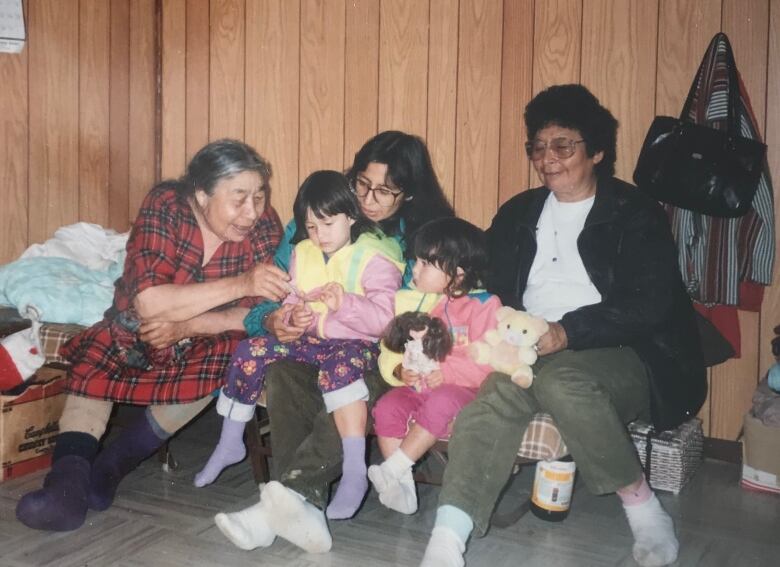 A family shot of a group of people. 