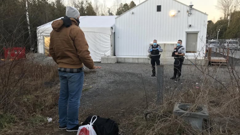 An asylum seeker at the Roxham Road crossing in Quebec.