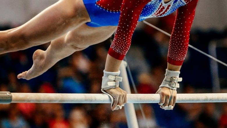 Gymnast on an apparatus.