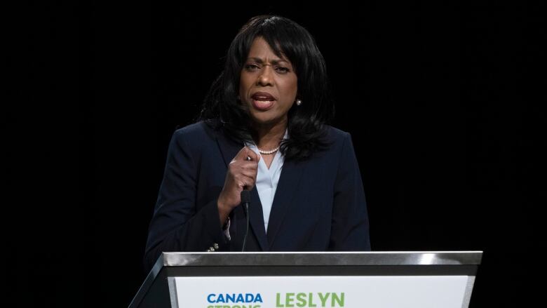 Female politician at podium