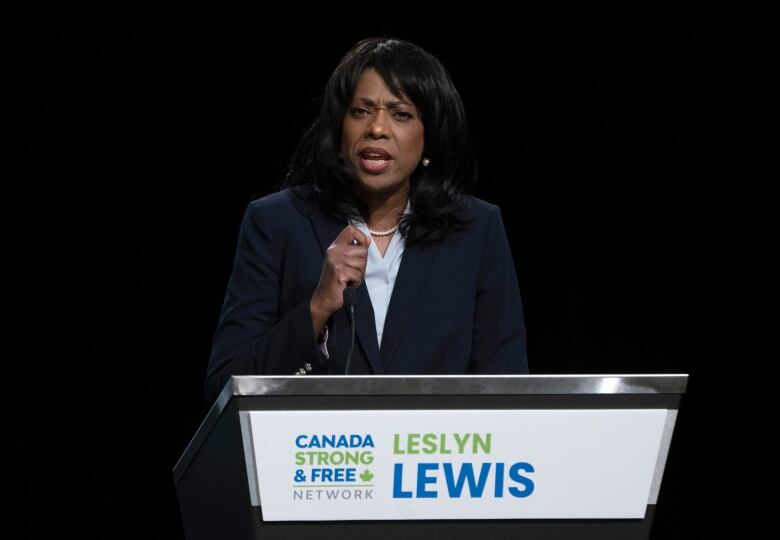 Female politician at podium