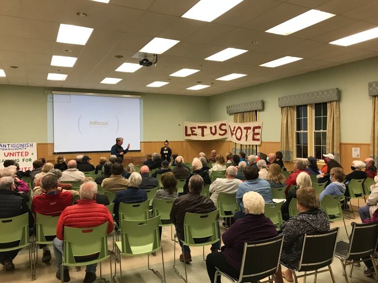 About 100 people, including two councillors, attended an informal public meeting on the merger on May 4.